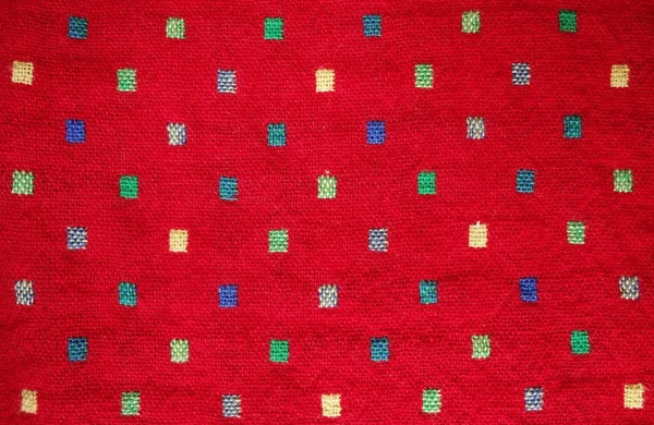Renkli desenli kırmızı kumaş