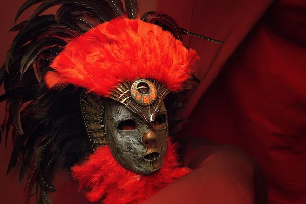 Decorative mask with feathers