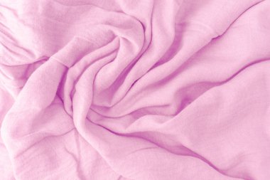 Arka plan için pembe kumaş dokusu, buruşuk battaniye, kırışıklıklar..