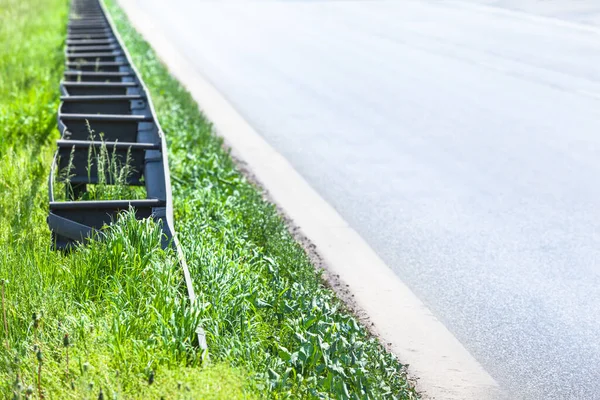 Empty Road Detail Grass Verge Guardrail Copy Space — Zdjęcie stockowe