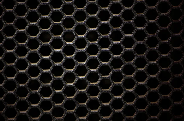 Maglia esagonale a nido d'ape in acciaio inox su nero — Foto Stock