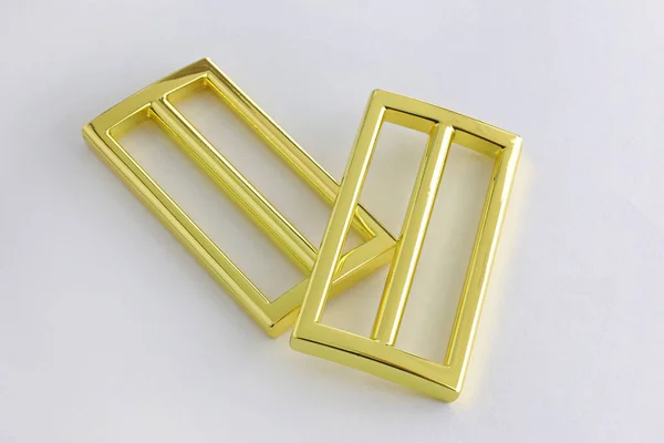 Gouden Riemverstellers Sluiten Tas Accessoires Een Witte Achtergrond Dubbelslotige Metalen — Stockfoto