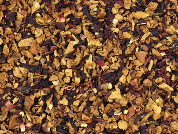 Červený Ovocný Čaj Kousky Ořechů Ibiškem Listy Pozadí Aromatický Čaj — Stock fotografie