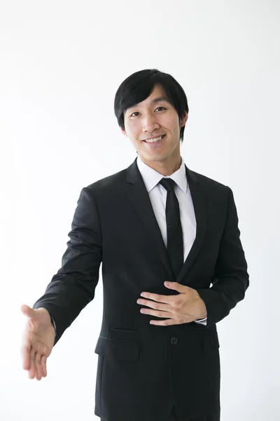 Asian business man ready to shake hands — Stock Photo, Image