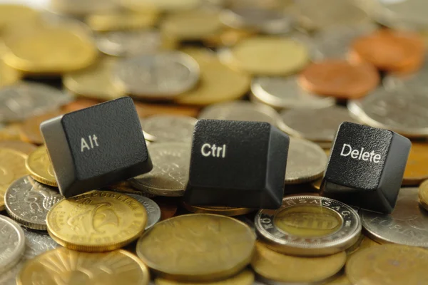 CTRL, alt, del computer sleutels en munten — Stockfoto