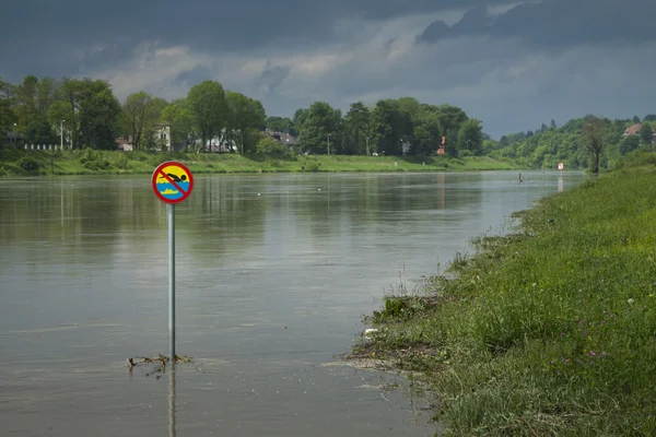 Poland, Kraków, Flood, No Swimming Sign over the Water