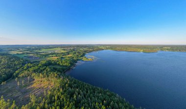 Panorama of the forest and lake by Satila village in sweden