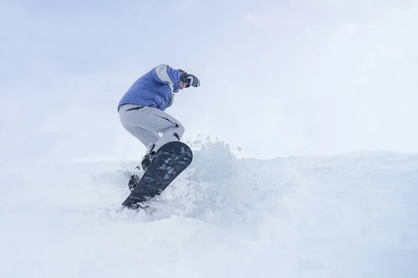 Extreme Performs Jump Snowboard Snow Flies Sides Jump —  Fotos de Stock