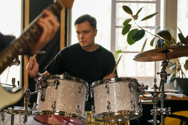 Drummer Sits Drum Set Plays Holds Drumsticks His Hands — Foto de Stock