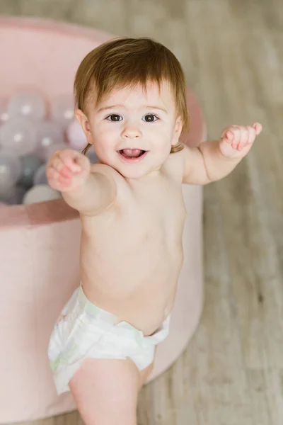 Cute Baby Girl Playing Balls Ball Pool Home Pastel Pink — стоковое фото