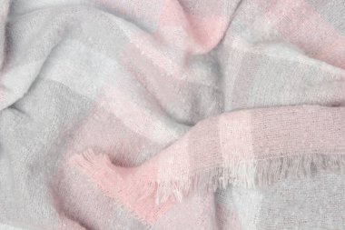 Ilık yün ekose yakın plan. Soyut tekstil arka planı veya dokusu. Soğuk hava için kış sıcacık arka plan.