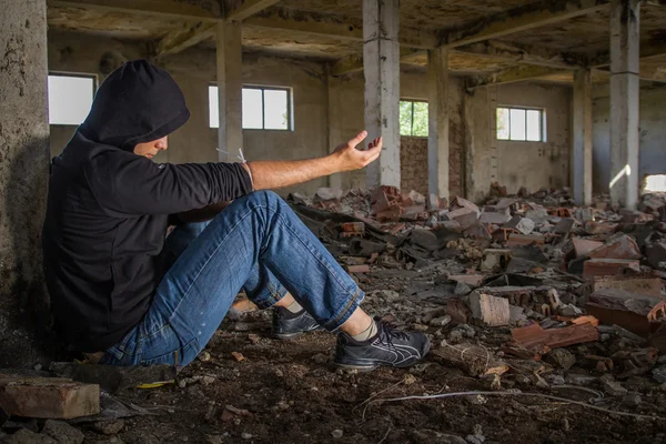 Drug Addict getting High in an Abandoned Building Dramatic — Stock Photo, Image