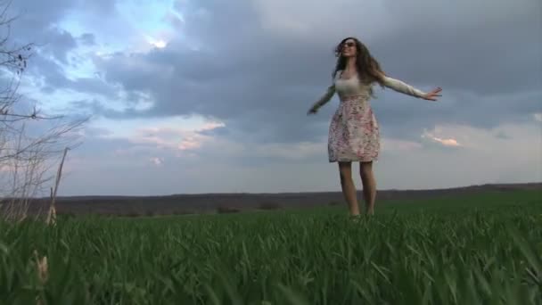 Woman Spinning and Jumping in Spring Rain — Stock Video