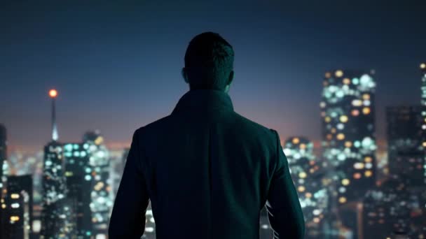 Young Businessman Looking Toward City Scape Sky Scrapers Inspiration Night Lights Business District Downtown Success Ambition 8K — Stock Video
