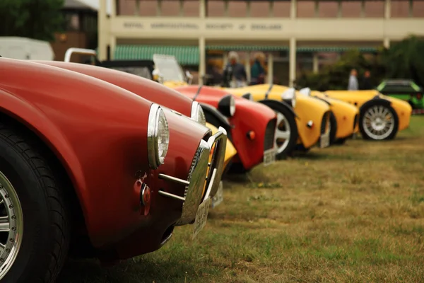 Coches deportivos rojos y amarillos Imagen De Stock