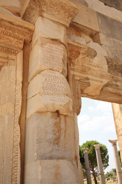 Inscriptions on the columns at Ephesus — Stock Photo, Image