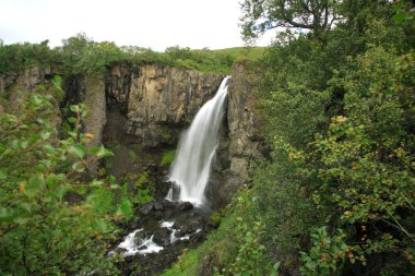 View of Hundafoss waterfall clipart