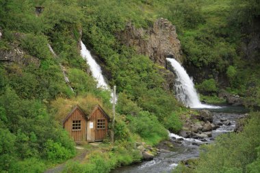 House by the waterfall clipart