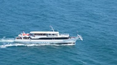 pleasure boat with people in the Crimea in Yalta