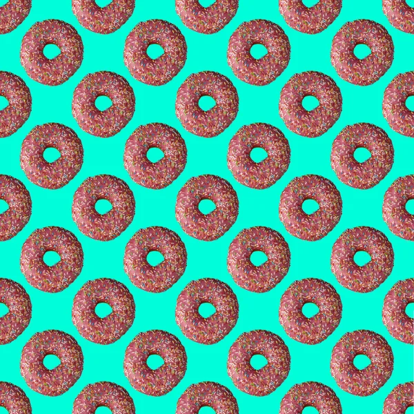 Seamless donut pattern with a shadow on a turquoise background — Stockfoto