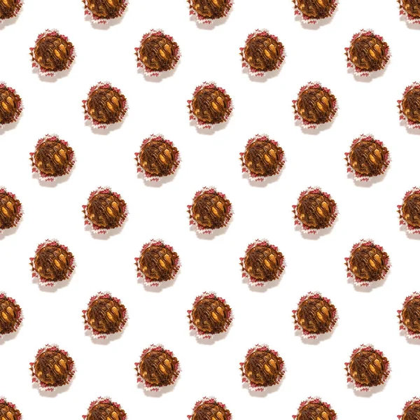 Seamless cupcake pattern in chocolate on a white background — Zdjęcie stockowe