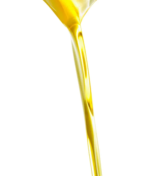 Наливание масла или золотой жидкости . — стоковое фото
