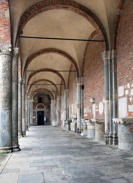 Basilica of Sant 'Ambrogio (379-386), Milan, Italy: atrium on the — стоковое фото