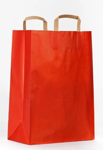 Κόκκινο χαρτί τσάντα για ψώνια. — Φωτογραφία Αρχείου