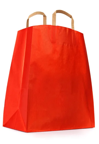 Kırmızı kağıt alışveriş çantası. — Stok fotoğraf