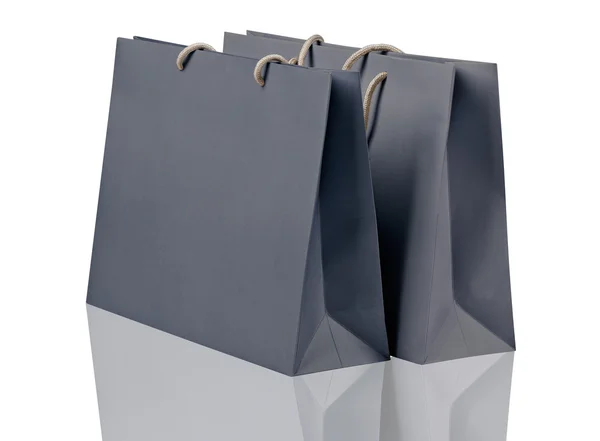 Grijze shopping tassen. — Stockfoto
