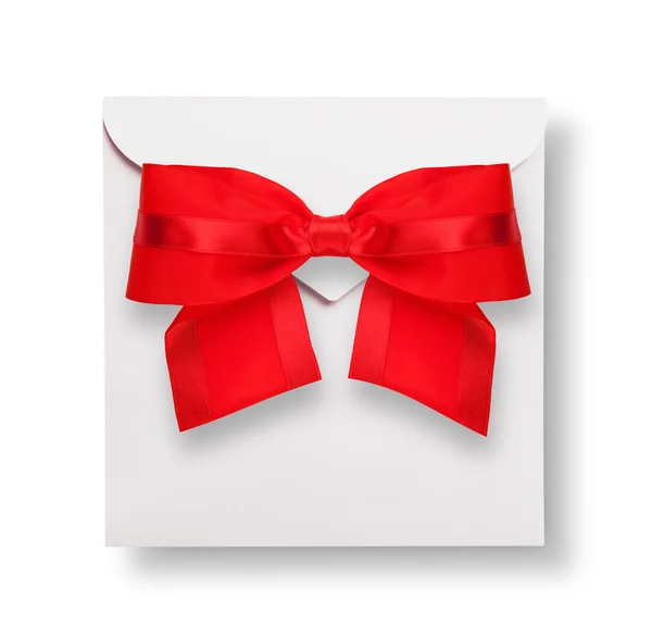 Weißer Umschlag mit roter Schleife — Stockfoto