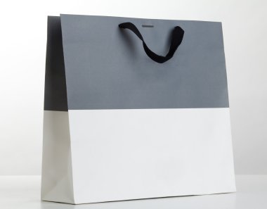 Grey and white shopping bag.