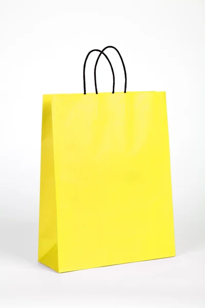 Saco de compras amarelo. — Fotografia de Stock