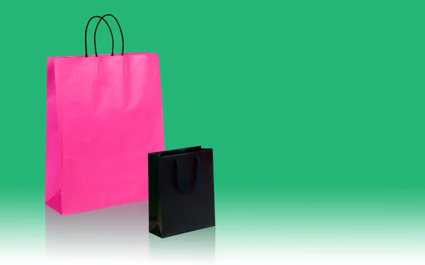 Sacos de compras preto e rosa, com espaço para o seu logotipo ou texto — Fotografia de Stock