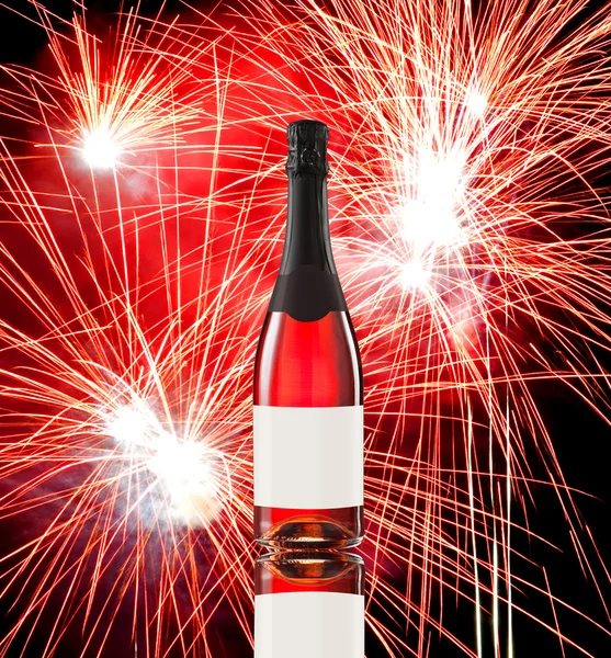 Fuegos artificiales y botella de vino — Foto de Stock