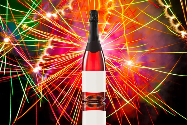 Fireworks and wine bottle — Stock Photo, Image