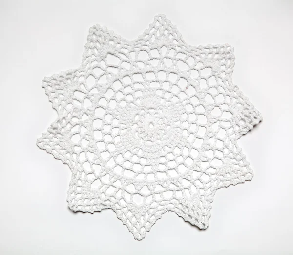 Crocheted lace on white — Stock Photo, Image
