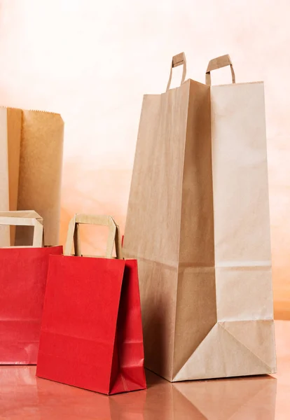 Group Paper Red Brown Shopping Bags Vertical Backgraound Space Your — Stock Photo, Image