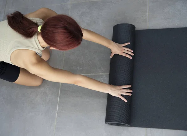 top view girl with yoga mat, space for text