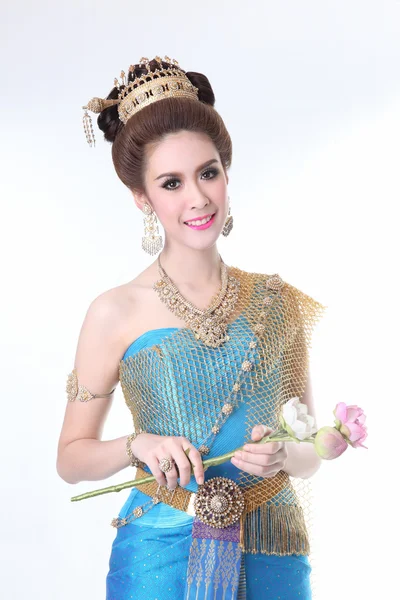 Elegant fashion asian woman posing with creative chignon hair-style and wearing blue thai dress — Stock Photo, Image