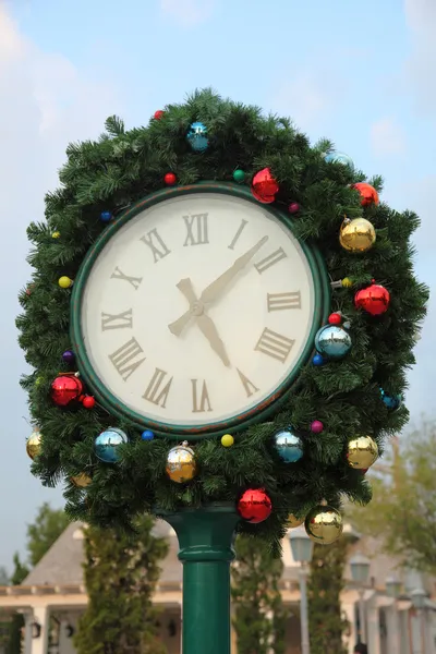 Christmas clock and fir branches — Stock Photo, Image