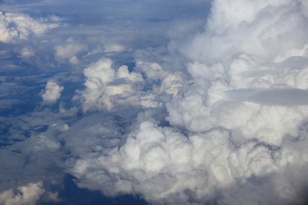 Niby na chmury na tle na firmamencie od airplane — Zdjęcie stockowe