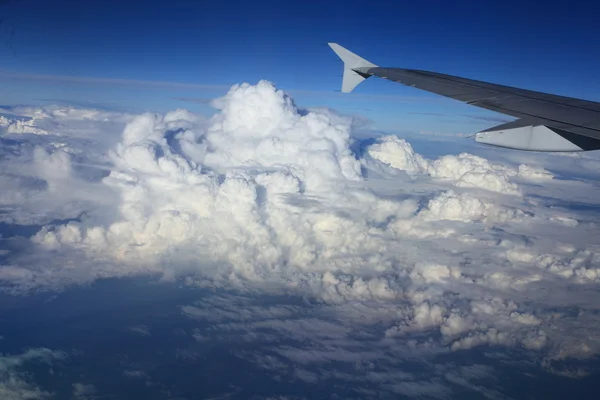 Kind on clouds on a background a firmament from an airplane — Stock Photo, Image