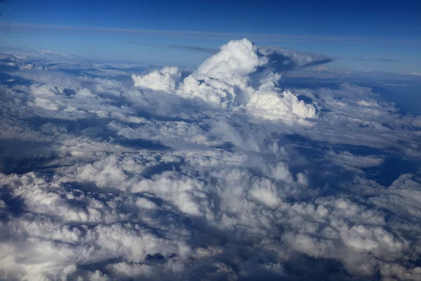 Kind on clouds on a background a firmament from an airplane — Stock Photo, Image