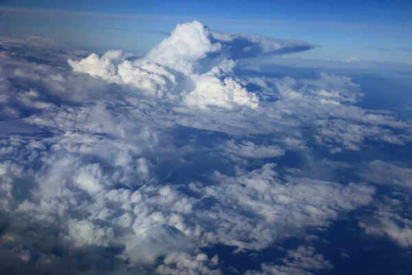 Kind on clouds on a background a firmament from an airplane — Stock Photo, Image