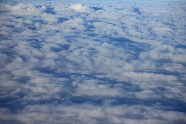 Kind on clouds on a background a firmament from an airplane — Stock Photo, Image
