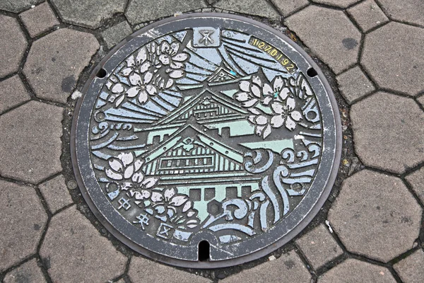 Manhole cover, Osaka japan — Stock Photo, Image