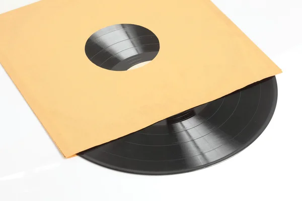 Oude vinyl record in een geval van papier — Stockfoto