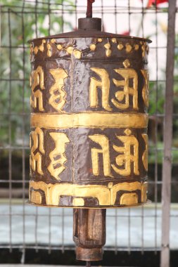 Tibetan prayer wheel clipart