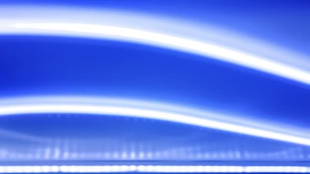Fond bleu abstrait avec des lumières blanches défocalisées — Video